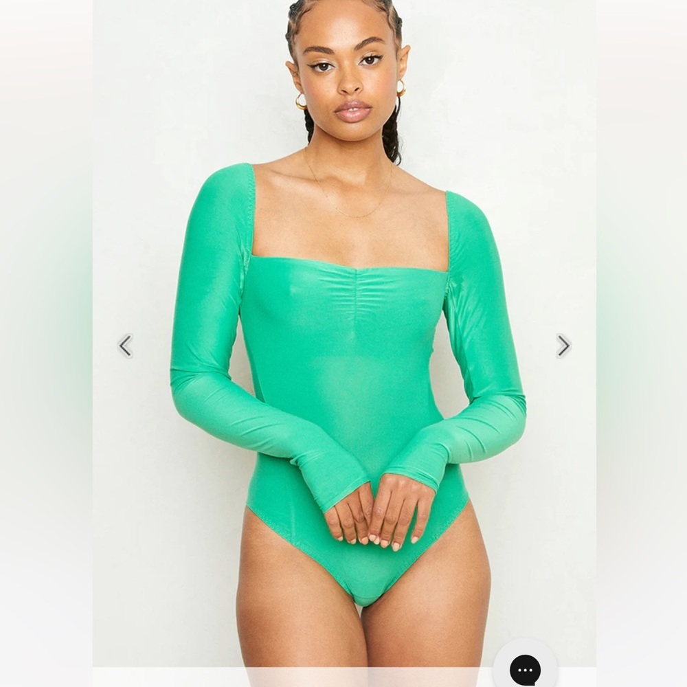 We Are HAH! Don't B Square Reversible long sleeve  Bodysuit; sz med; green. nwot